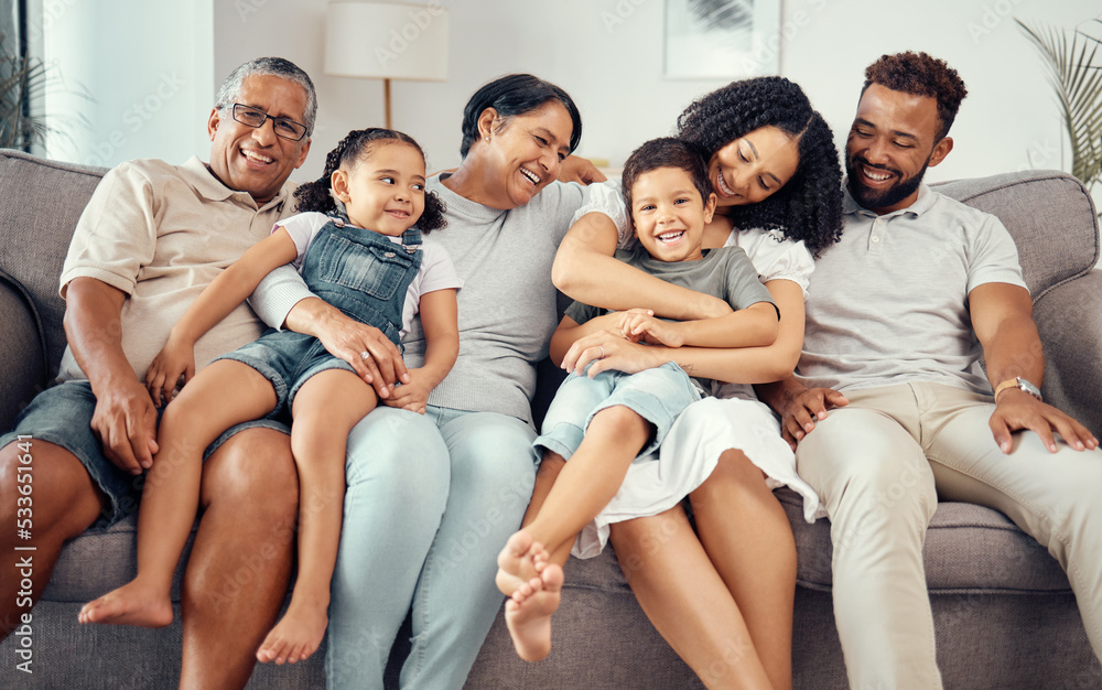 Love, children with grandparents in a big family as mother and father hugging kids on the sofa or couch. Dad mom and young children happy to enjoy bonding with lovely grandmother and old man at home Love, children with grandparents in a big family as mother and father hugging kids on the sofa or couch. Dad mom and young children happy to enjoy bonding with lovely grandmother and old man at home