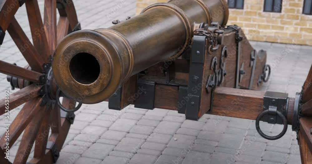 Exhibition of gun. A view of exhibition on old guns with a cannon in the city park. Exhibition of gun. A view of exhibition on old guns with a cannon in the city park.