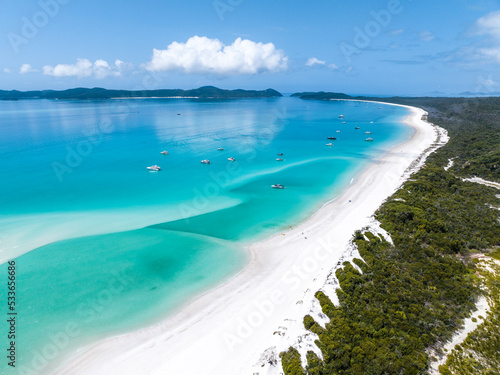 Beautiful high angle aerial drone view of famous Whitehaven Beach, part of the Whitsunday Islands National Park near the Great Barrier Reef, Queensland, Australia. Popular tourist destination. © Juergen Wallstabe