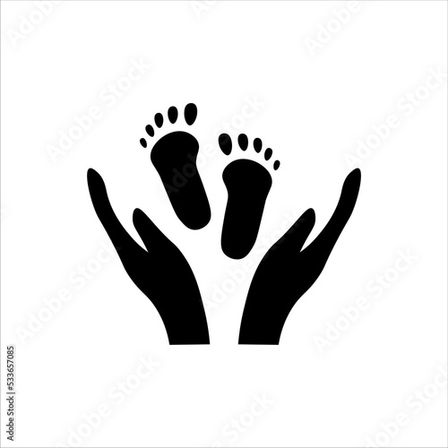 baby feet in hands icon vector