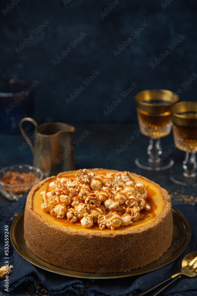 cheesecake with popcorn and salted caramel sauce