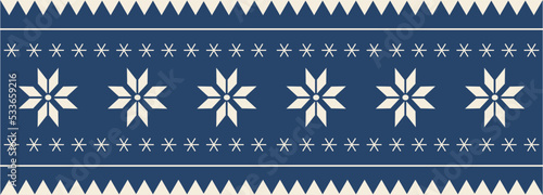 Christmas and New Year seamless pattern. Flat knitting pattern, Fair Isle in blue and white with Scandinavian snowflakes for winter hat, sweater, jumper, paper or other designs.
