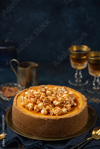 cheesecake with popcorn and salted caramel sauce