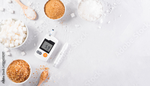 World diabetes day awareness concept. The diabetes measure set and different kind of sugar, a symbol of diabetic control in the blood, 14 November. photo