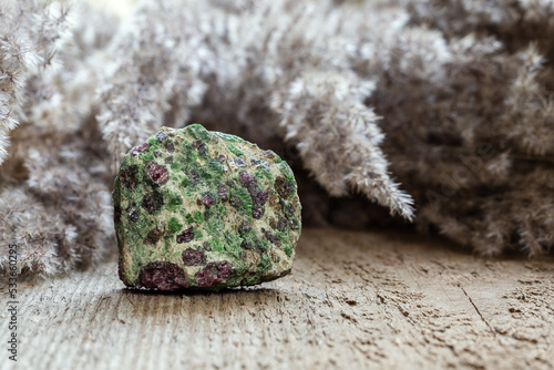 Eclogite rock with green pyroxene and red garnet photo