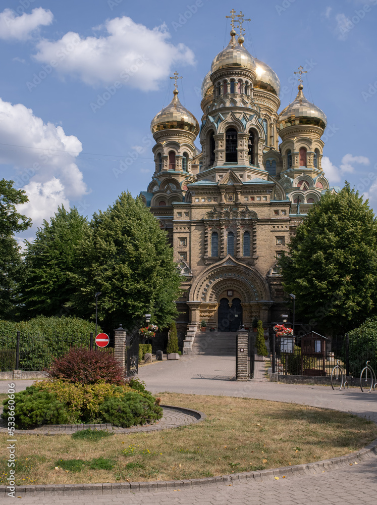 Obraz premium Liepaja, Latvia - August 19, 2022: Beautiful scenery of Liepaja town and surroundings in Latvia during a summer sunny day. St Nicholas Naval Cathedral, Karosta. Selective focus.
