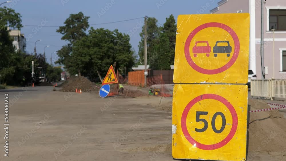 Road Sign Speed Limit 50 Km H In Combination With Road Work Ahead road-sign-speed-limit-50-km-h-in-combination-with-road-work-ahead