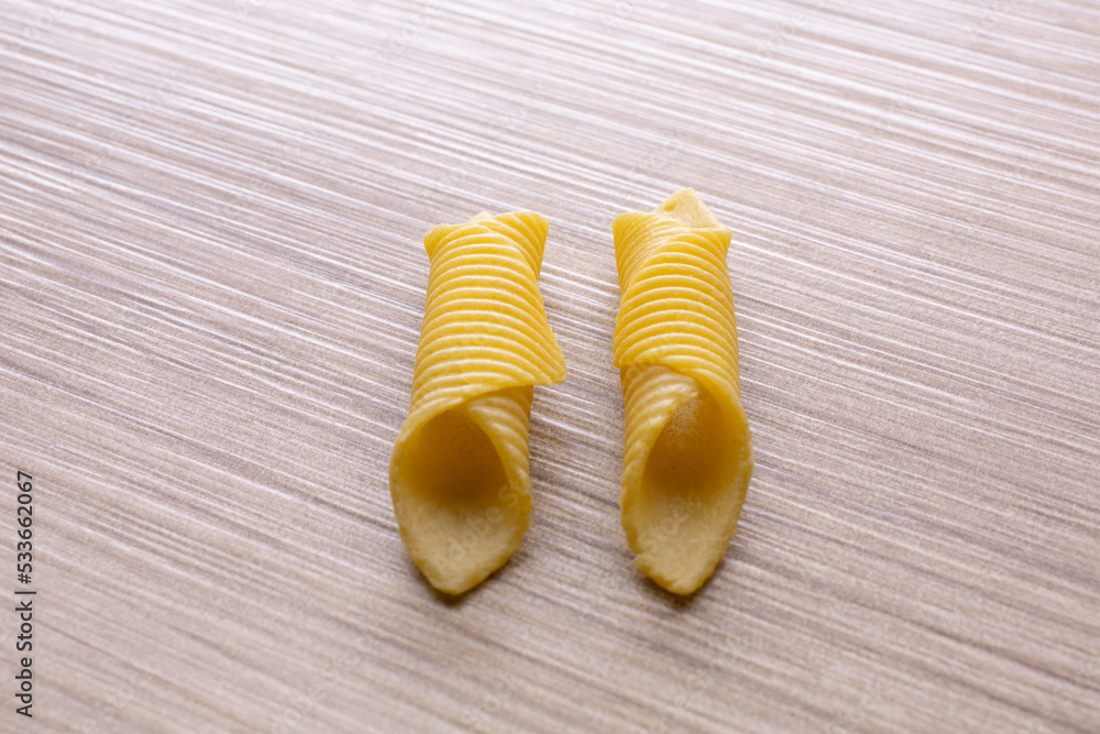 short pasta compositions on wooden background Stock Photo | Adobe Stock