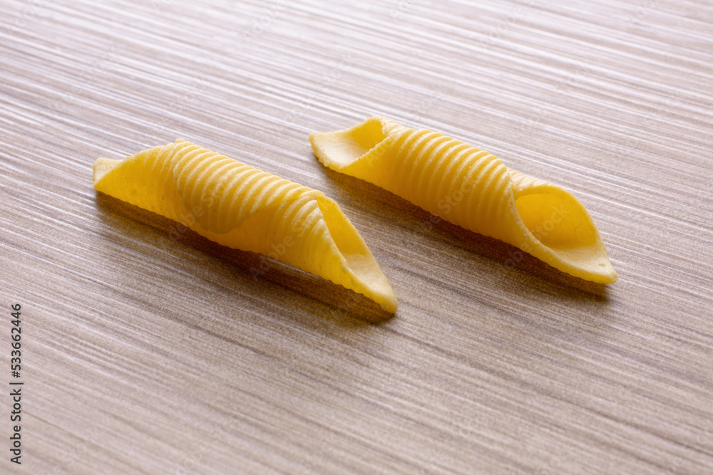 short pasta compositions on wooden background Stock Photo | Adobe Stock