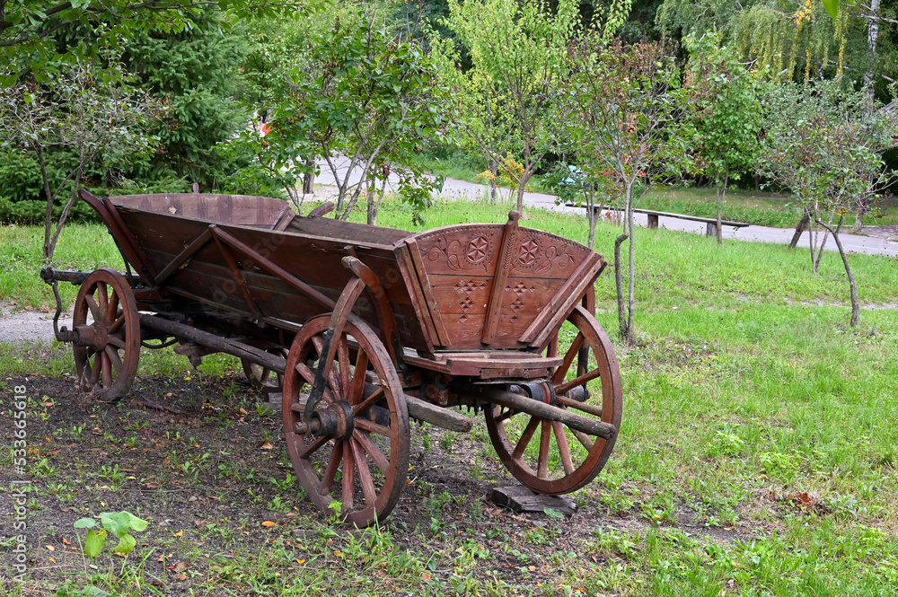 An old cart near a house in a Ukrainian village 