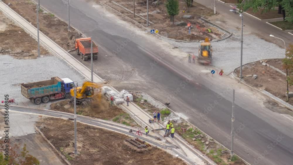 Industrial truck loader excavator moving ground and loading into a ...