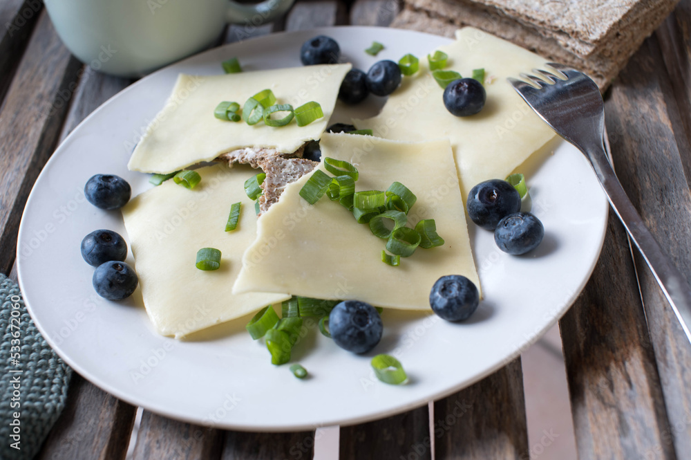 Crispbread sandwich with cheese. Made with low carb fiber bread Crispbread sandwich with cheese. Made with low carb fiber bread