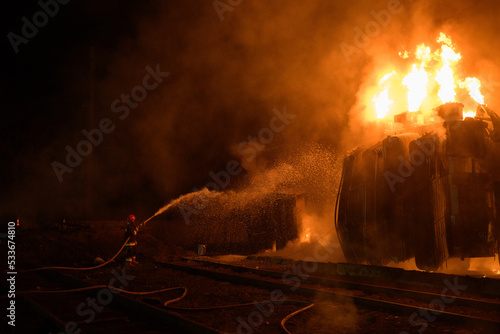 Firemen put out a fire on a transformer after the missile attack in Ukraine