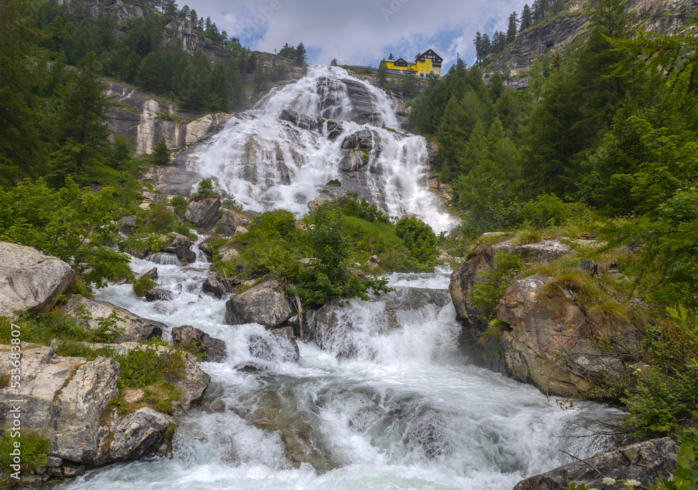 View of Toce Waterfall in Formazza Valley, province of Verbano-Cusio-Ossola, Italy. With a jump of 143 meters it is the second highest waterfall in Europe View of Toce Waterfall in Formazza Valley, province of Verbano-Cusio-Ossola, Italy. With a jump of 143 meters it is the second highest waterfall in Europe