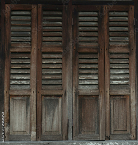 old wooden window of a Malay house