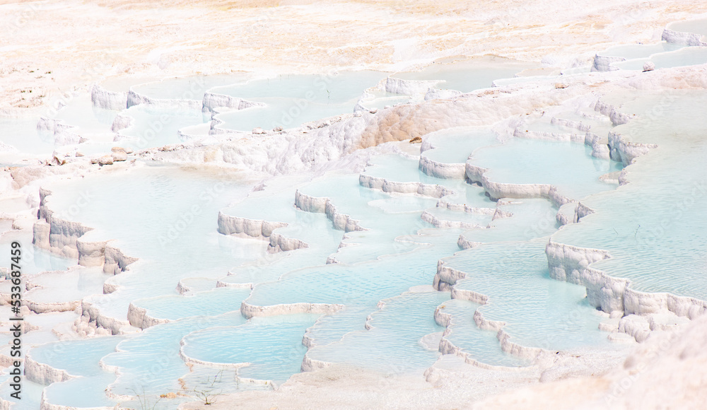 Fototapeta premium Emerald water in white limestone rock.