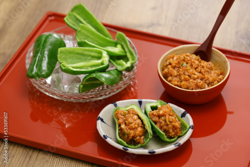 chilled fresh green peppers and Niku Miso (ground pork miso dip), a Japanese appetizer