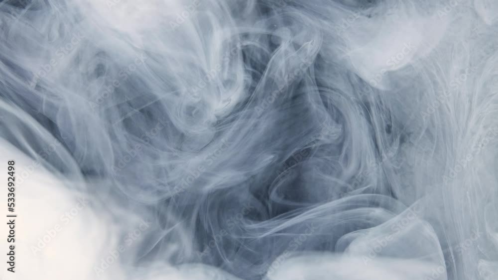 Acrylic cloud abstract smoke background. White ink spreading in water on a black background. Acrylic cloud abstract smoke background. White ink spreading in water on a black background.