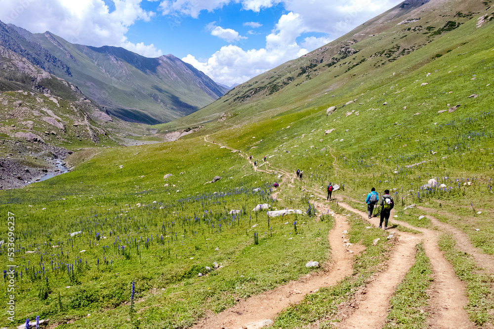 Beautiful mountain scenery. River, valley, snow, blue sky, white clouds. In-depth trip on the Sonamarg Hill Trek in Jammu and Kashmir, India Beautiful mountain scenery. River, valley, snow, blue sky, white clouds. In-depth trip on the Sonamarg Hill Trek in Jammu and Kashmir, India