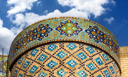 Islamic mosaic art against b sky in the Bukhara, Uzbekistan