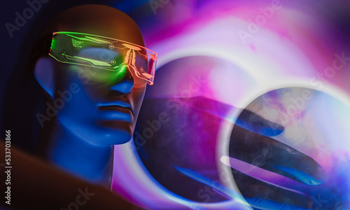 Robot with futuristic eyeglasses in front of glowing spheres photo