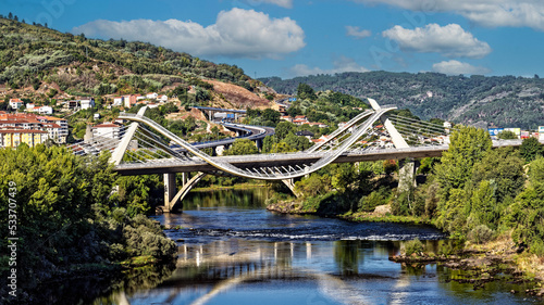 Panoramic view of landmark Millennium bridge over river Miño in the city of Ourense, Galicia, Spain. © Lux Blue