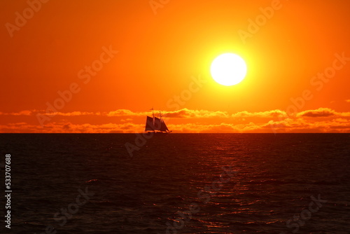 sailboat silhouette at sunset