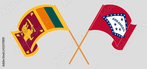 Crossed and waving flags of Sri Lanka and The State of Arkansas
