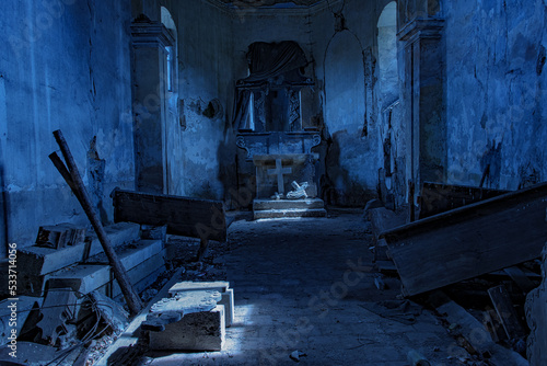 The interior of an old damaged church with moonlight Fototapet