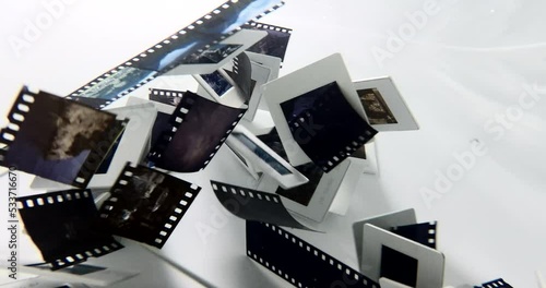 35mm film slides swimming under the water shuffling hovering spreading and moving light shines through old photos with beautiful colors waves experimental film full hd high quality