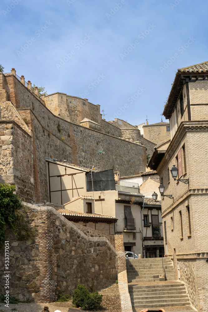 Calle Cristo de la Luz and the wall of the medieval town of Toledo