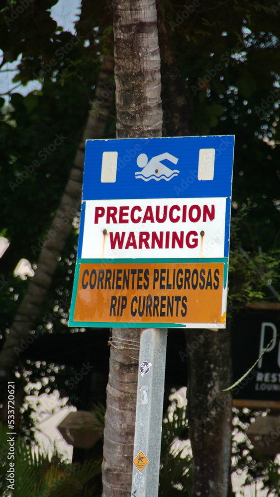 Rip current warning sign in Tamarindo, Costa Rica