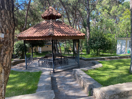 Pavilions and pines in a park in Antalya