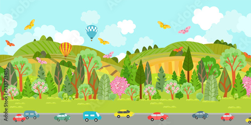Panorama of summer scenery with hills. Road traffic in front of