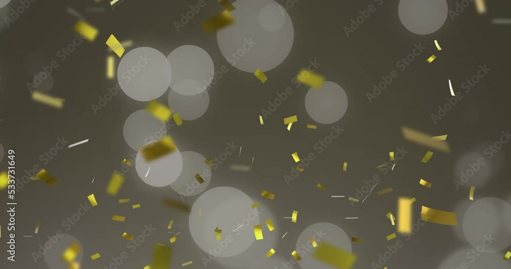 Animation of gold christmas confetti falling with spots of light on grey background Animation of gold christmas confetti falling with spots of light on grey background