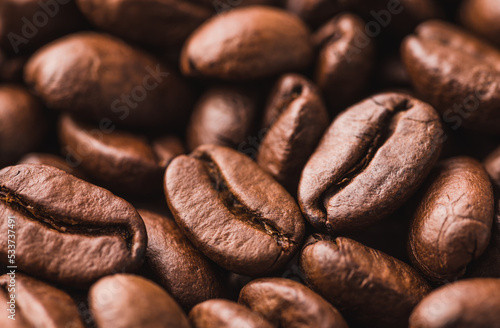 Coffee beans texture close up background.