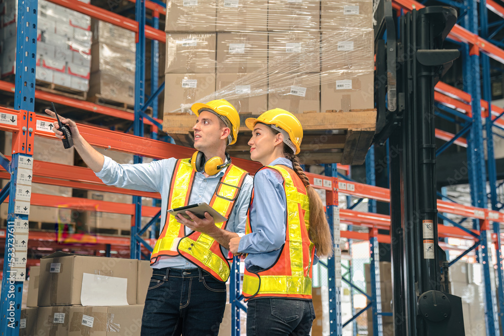 Caucasian man, woman warehouse supervisor discuss and use tablet check package with forklift driver worker load box on shelf, product distribution inventory management,Logistics shipping business plan Caucasian man, woman warehouse supervisor discuss and use tablet check package with forklift driver worker load box on shelf, product distribution inventory management,Logistics shipping business plan