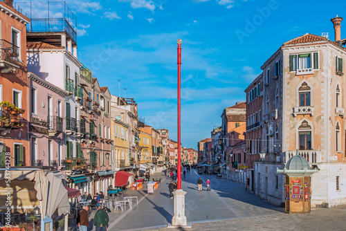 The Riva Degli Schiavoni was built in the 19th century and it is a promenade that sits on the waterfront at St. Mark's Basin and main pedestrian street, often overcrowded of tourists in Venice. 2019 © Wagner