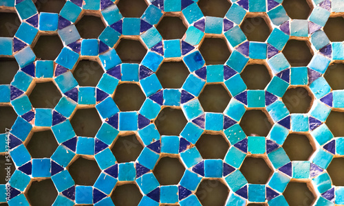 Geometric blue mosaic art pattern in the Bukhara, Uzbekistan 