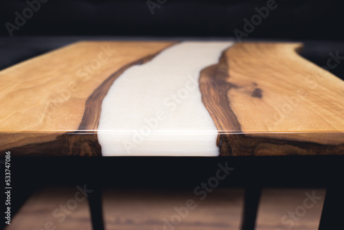 Wooden table with epoxy resin. River table. Designer furniture.