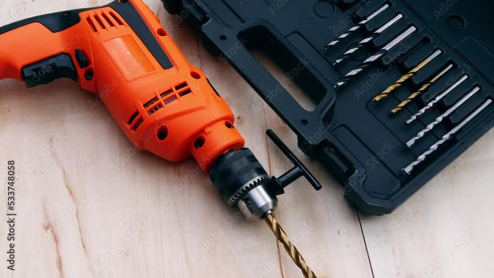 Electric power drill with bits for diy close up shot Electric power drill with bits for diy close up shot