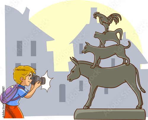 photographer boy takes photo of bremen town musicians monument