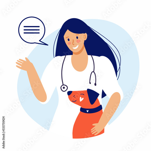 The veterinarian girl greets, waves and hugs the dog