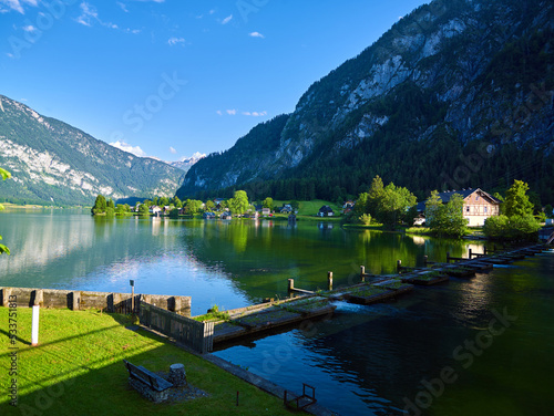 Panoramic mountain landscape of Hallstatt lake at sunny day in Austrian Alps  Salzkammergut region.