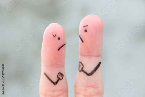 Fingers art of couple during quarrel.