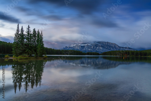 Two Jack Lake is a picturesque emerald green lake in Banff National Park with a sweeping view of Mount Rundle. 