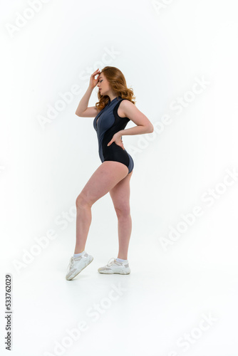 model size posing bodysuit on white background