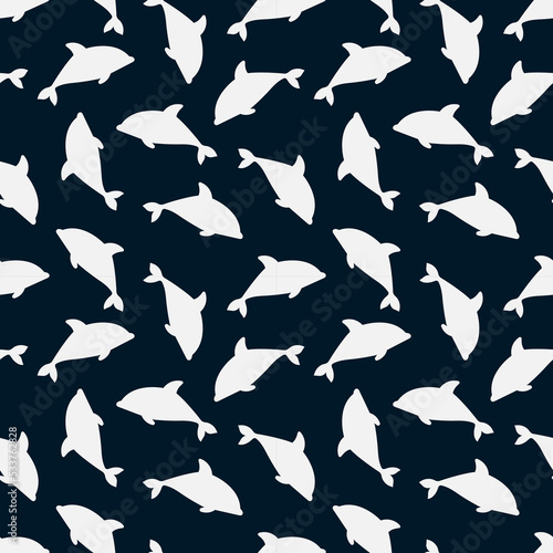 Seamless pattern with dolphins . Vector background on blue