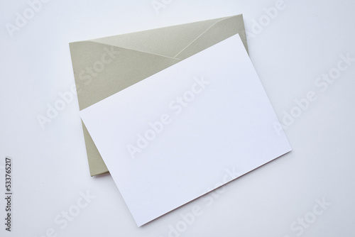 Paper envelopes on a light background. New mail, write a message. Send and receive mail. Postal delivery service. Empty envelope, empty space. Communication with people, paperwork. Envelope close-up 