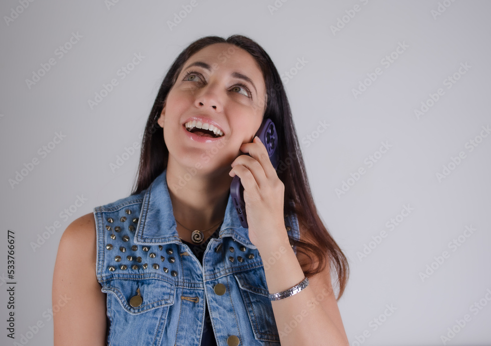 woman talking on the phone and making expression woman talking on the phone and making expression
